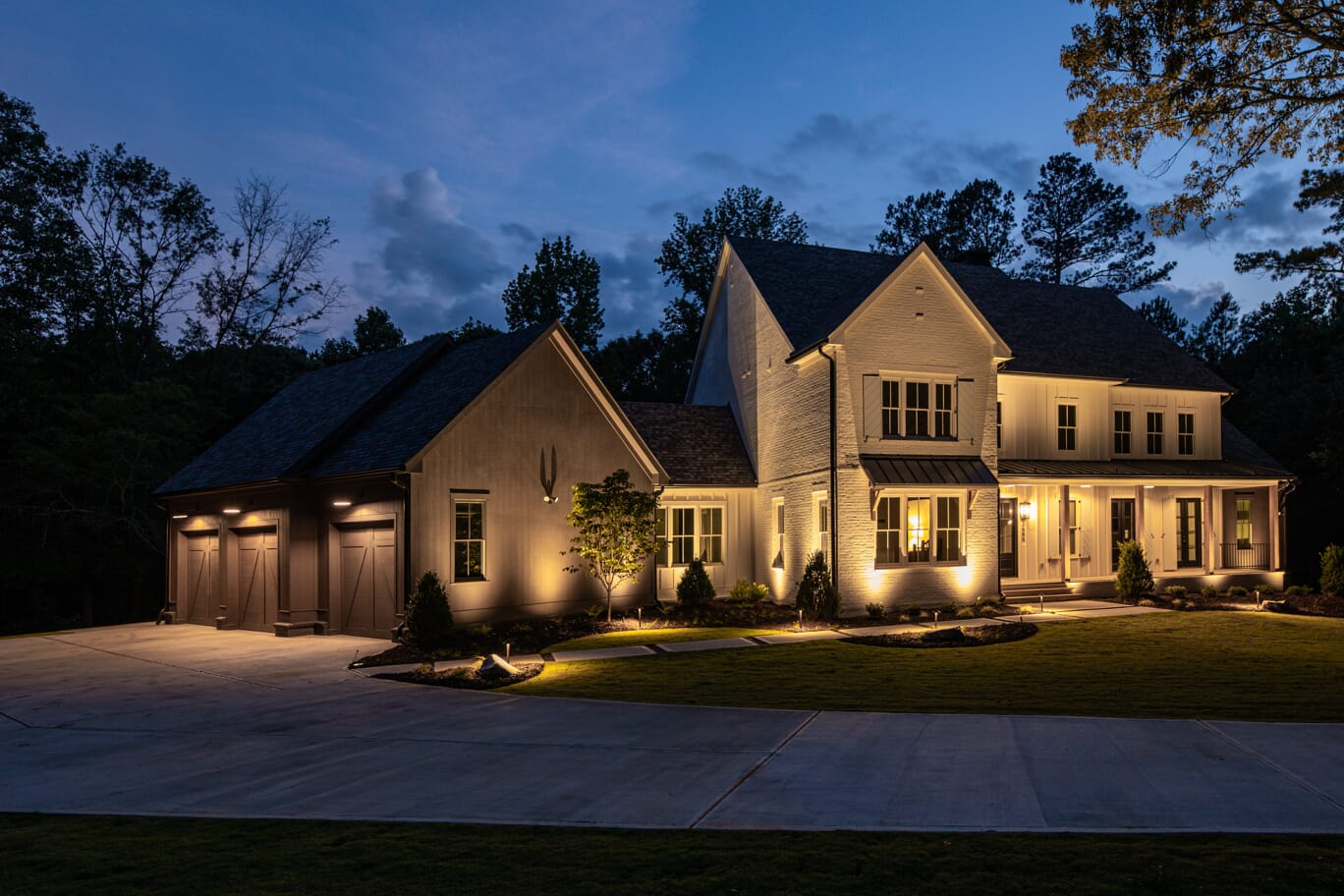 home with outdoor lighting